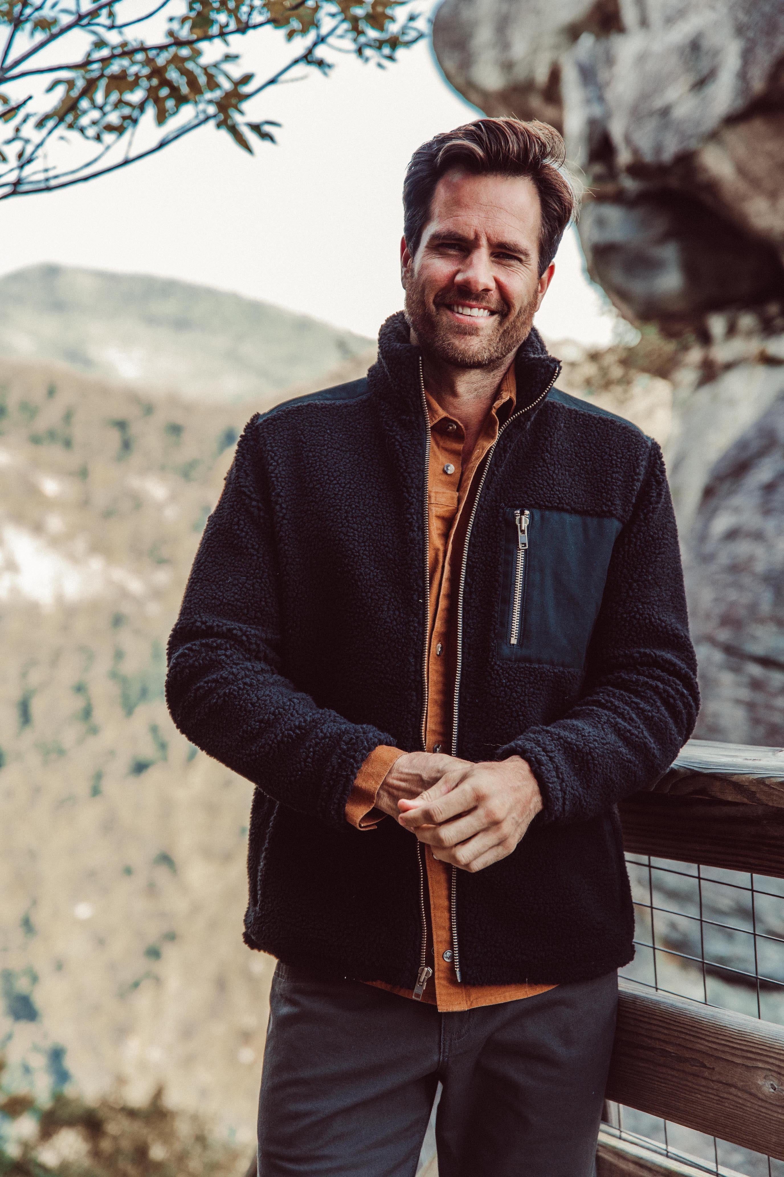 Man wearing Forge Jacket standing outside